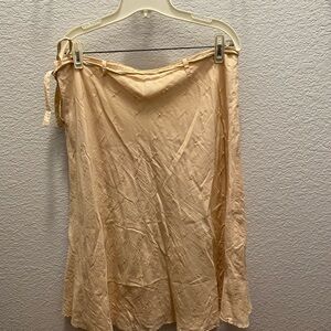 Odille cream color skirt with some shiny design. Size 14